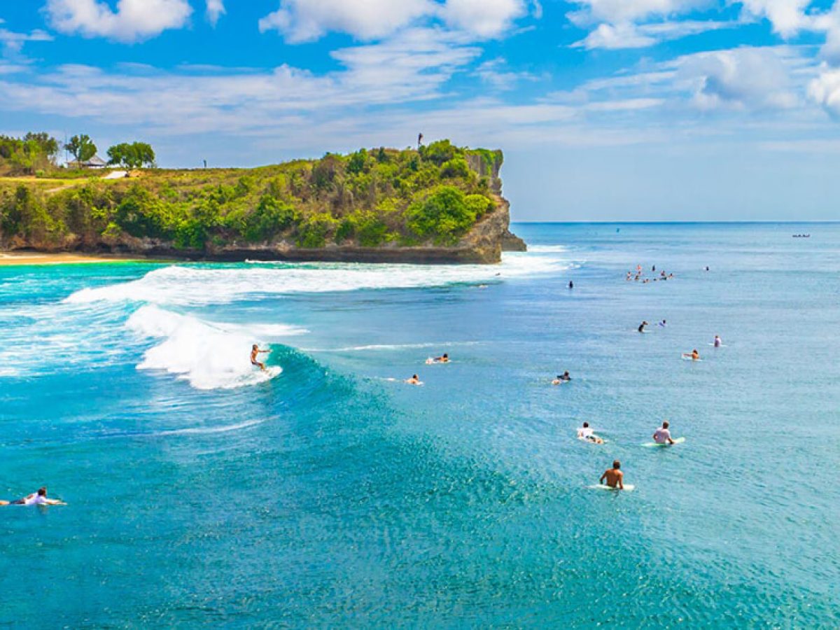 Surfing at Suluban Beach Bali